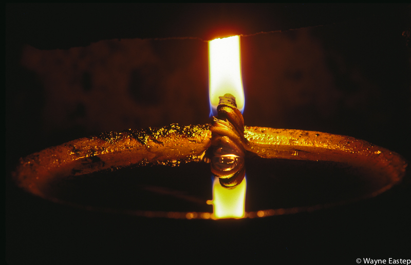 Burning vegetable oil to create soot used to make high grade sumi-ink sticks