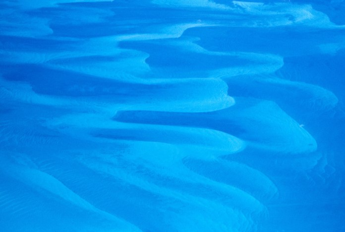 Sandbank in the Atlantic Ocean near the Bahamas, illustrating the effects of wind.